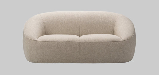 Beige sofa on a grey background