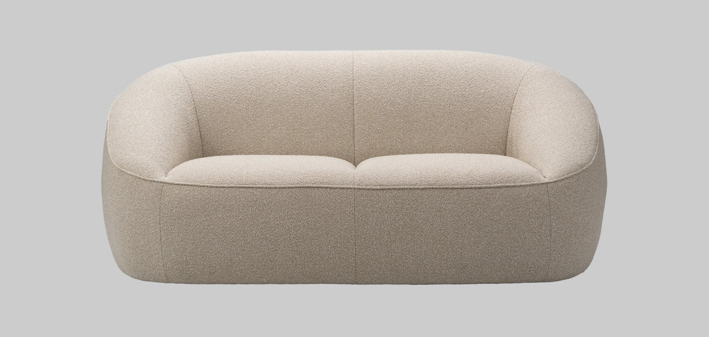 Beige sofa on a grey background
