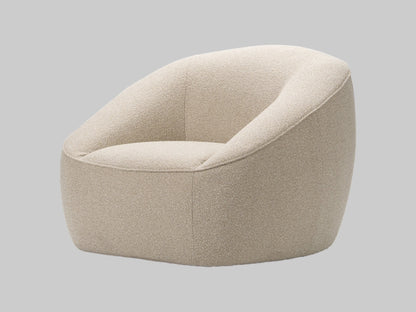 Beige armchair on a grey background